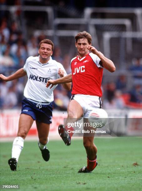 Sport, Football, London, England, The Wembley Tournament, 13th August 1988, Arsenal 4 v Tottenham Hotspur 0, Arsenal's Tony Adams beats Tottenham's...