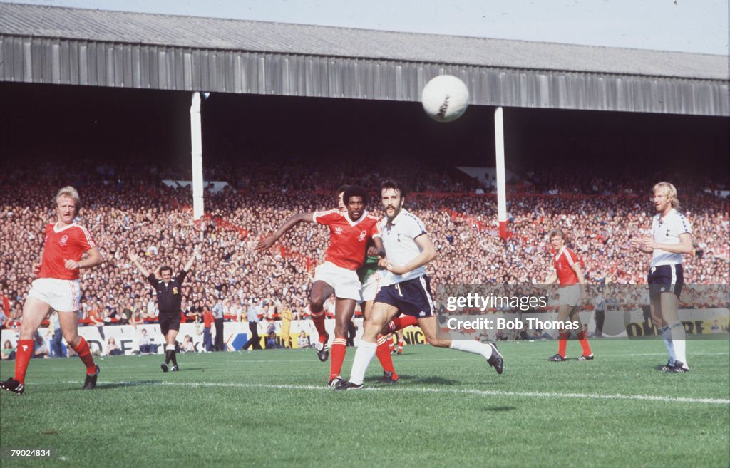 Sport. Football. Division One. City Ground, England. 1978. Nottingham Forest v Tottenham Hotspur. Forest's Viv Anderson clears from Tottenham's new striker Ricardo Villa.