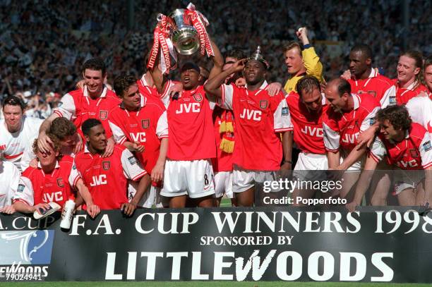 Football, 1998 FA Cup Final, Wembley, 16th May Arsenal 2 v Newcastle United 0, The Arsenal team celebrate with the FA Cup trophy as they complete the...