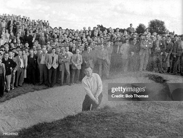 Dunlop Championships Sunningdale, Berkshire, British golfer Arthur Lees is pictured blasting out of the sand-trap, watched by crowds of spectators