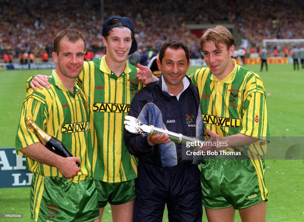 Sport. Football. Division 2 Play-Off Final. Wembley, London, England. 30th May 1993. West Bromwich Albion 3 v Port Vale 0. West Brom Manager Osvaldo (Ossie) Ardiles celebrates with his players L-R: Nicky Reid, Andy Hunt, and Kevin Donovan (right).