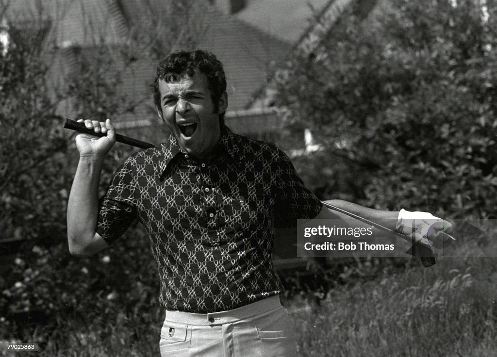 Golf. 1974 British Open Golf Championship, Royal Lytham St. Annes. July, 1974. Great Britain's Tony Jacklin yawning as he performs stretching exercises.