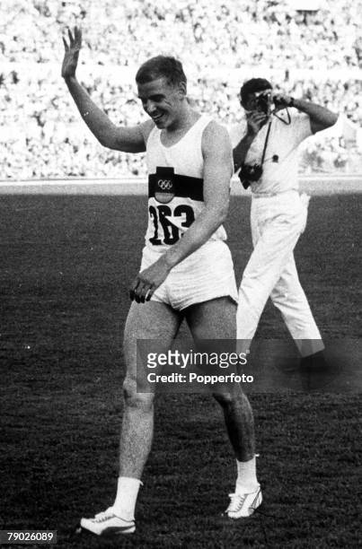 Olympic Games, Rome, Italy, Men's 100 Metres Final, German gold medal winner Armin Hary waves to the crowd after the race