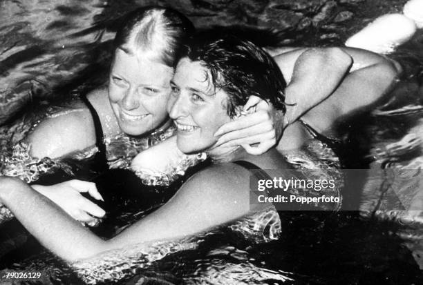 Olympic Games, Rome, Italy, Swimming, Women's 100 Metres Freestyle, Australian gold medal winner Dawn Fraser is hugged by USA's silver medallist...