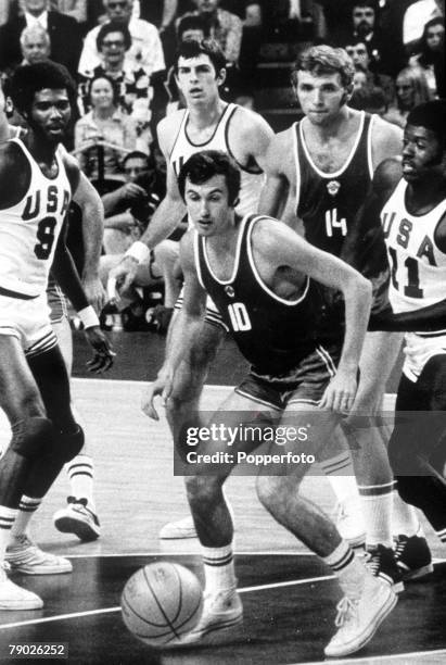 Action between the Soviet Union and United States teams in the final of the Basketball event at the 1972 Summer Olympics inside the...