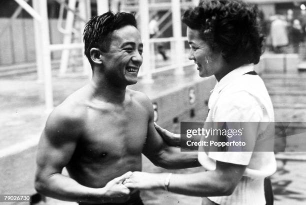 Olympic Games, London, England, Men's High Diving, USA's gold medal winner Samuel Lee is congratulated by Women's gold medal winner Victoria Draves