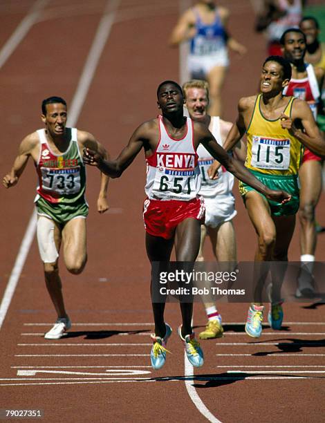 Kenyan athlete Paul Ereng crosses the line in first place to win the gold medal in the final of the Men's 800 metres event inside the Olympic Stadium...