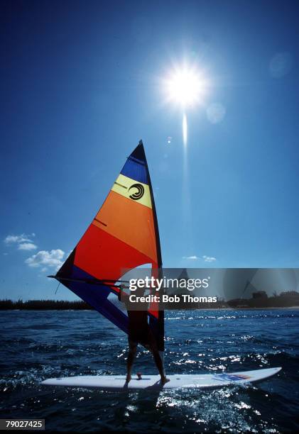 Sport, Windsurfing, Nassau, New Providence Island, The Bahamas, October 1985, A windsurfer sails at Cable Beach