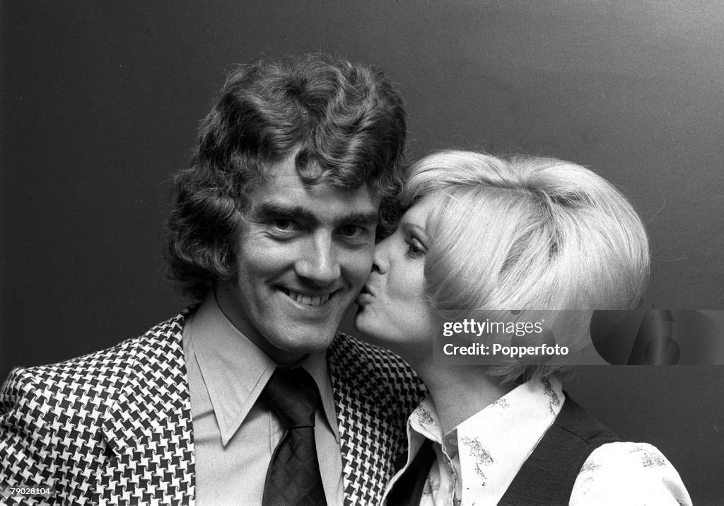 Sport. Football. England. 27th September 1972. Manchester United's new ?220,000 signing from Bournemouth Ted MacDougall is pictured with his wife Joan.