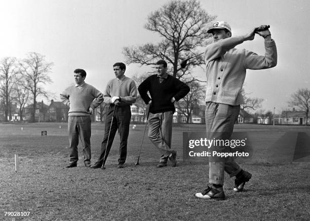 Sport, Football, England Manchester United's L-R: Johnny Giles, Shay Brennan and Noel Cantwell watch team-mate Bill Foulkes drive from the tee during...