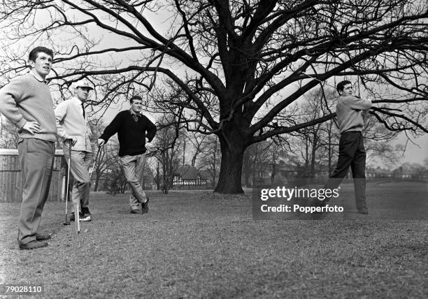 Sport, Football, England Manchester United's L-R: Johnny Giles, Bill Foulkes and Noel Cantwell watch team-mate Shay Brennan drive from the tee during...