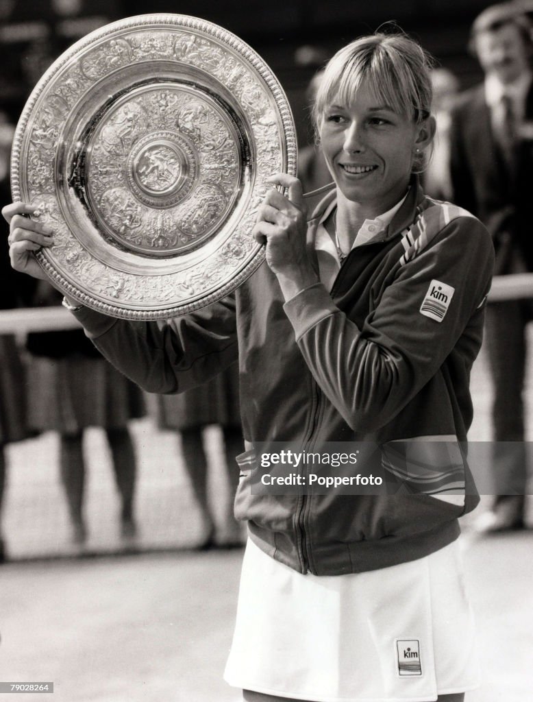 Sport. All England Lawn Tennis Championships. Wimbledon, London, England. 7th July 1984. Ladies Singles Final. Martina Navratilova holds aloft the Ladies Singles trophy after beating fellow American Chris Evert on Centre Court.