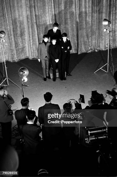 Elevated view of the members of British rock group the Beatles, on the set of the television variety series, 'The Ed Sullivan Show' at CBS's Studio...