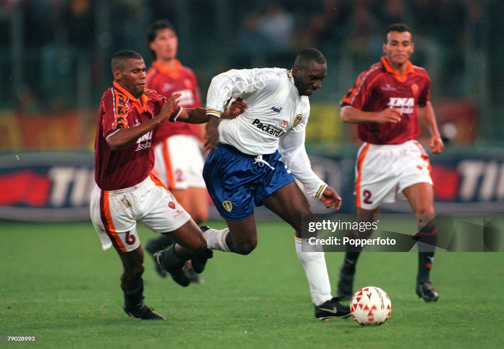 Sport. Football. UEFA Cup Second Round, First Leg. Rome, Italy. 20th October 1998. Roma 1 v Leeds United 0. Leeds United's Jimmy Floyd Hasselbaink is challenged by Roma's Aldair.