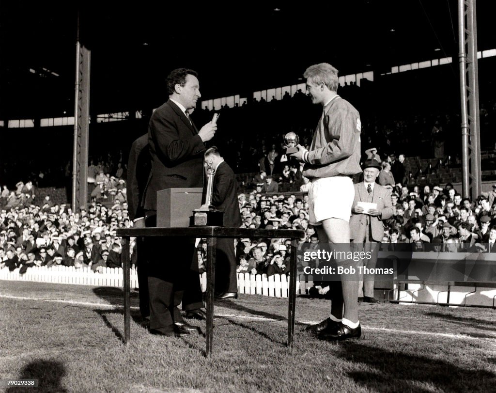Sport/Football. Old Trafford, England. 1964. Manchester United striker Denis Law receives his award after being chosen as the European Footballer of the Year for 1964.