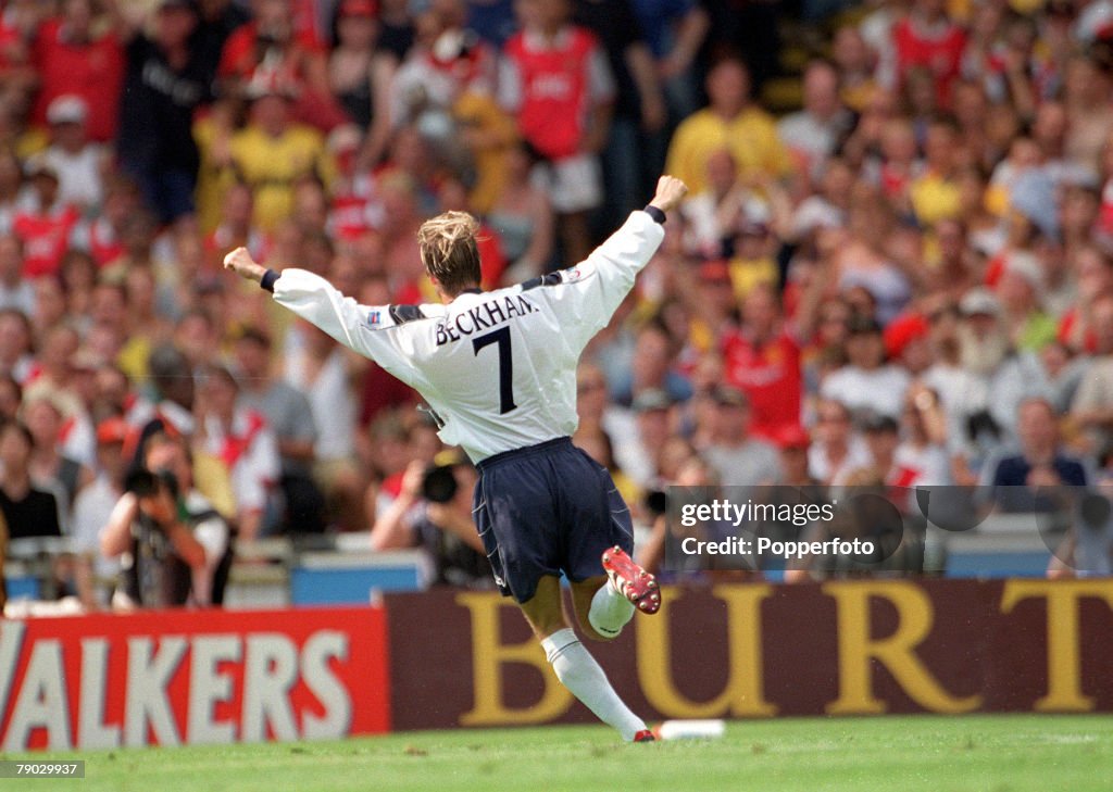 Football. 1999 FA Charity Shield. Wembley. 1st August, 1999. Arsenal 2 v Manchester United 1. Manchester United's David Beckham celebrates after scoring the first goal from a free kick.