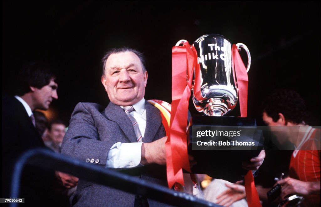 Sport. Football. Milk (League) Cup Final. Wembley, London, England. 26th March 1983. Liverpool 2 v Manchester United 1. Liverpool Manager Bob Paisley is pictured with the trophy, having become the first Manager to climb the steps to receive the trophy at 
