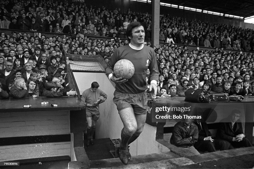 Sport. Football. England. 1969. Liverpool FC's Tommy Smith runs out onto the pitch at Anfield.