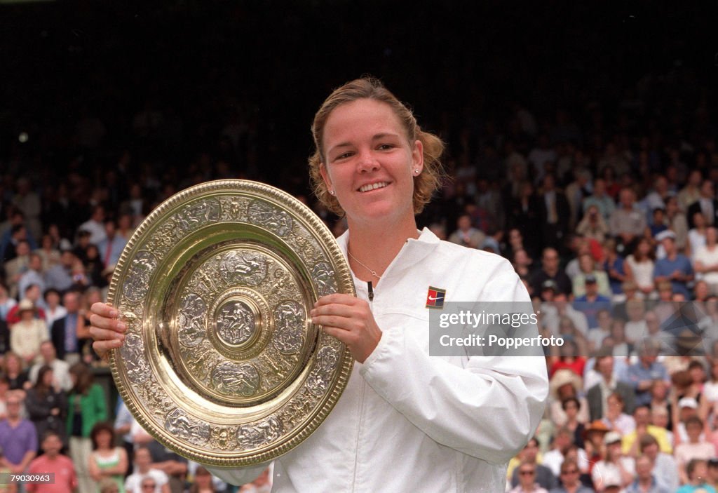 1999 Wimbledon Lawn Tennis Championships. Ladies Singles Final. USA's Lindsay Davenport holds the trophy after defeating Steffi Graf in the Final.