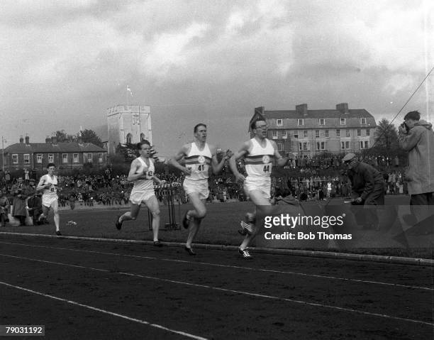 Sport, Athletics, Four Minute Mile, Iffley Road, Oxford, England, 6th May 1954, Great Britain's Chris Brasher leads from Roger Bannister and Chris...