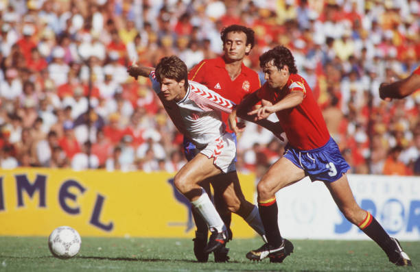 World Cup Finals, Second Phase, Queretaro, Mexico, 18th June Spain 5 v Denmark 1, Denmark's Michael Laudrup races past Spain's Antonio Camacho and...