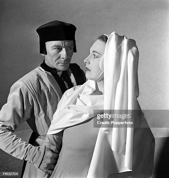 Stratford upon Avon Shakespeare Festival. England. 1950. Legendary British actor John Gielgud is pictured in his role as Angelo with Barbara Jefford as Isabella in the play "Measure for Measure". Stratford upon Avon Shakespeare Festival. England. 1950. Legendary British actor John Gielgud is pictured in his role as Angelo with Barbara Jefford as Isabella in the play "Measure for Measure".