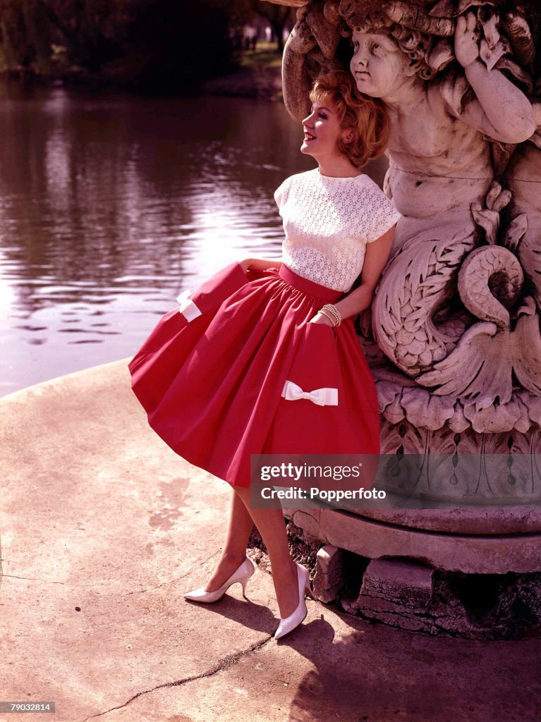 White Sleeveless Top and Red Full Skirt