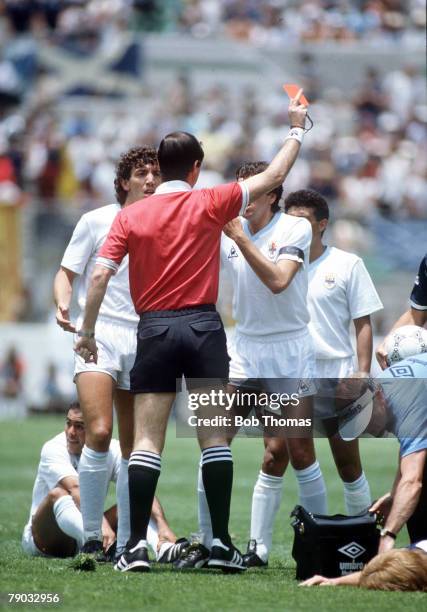 World Cup Finals, Neza, Mexico, 13th June Scotland 0 v Uruguay 0, Uruguay's Jose Batista is shown the red card by the referee after a foul on Gordon...