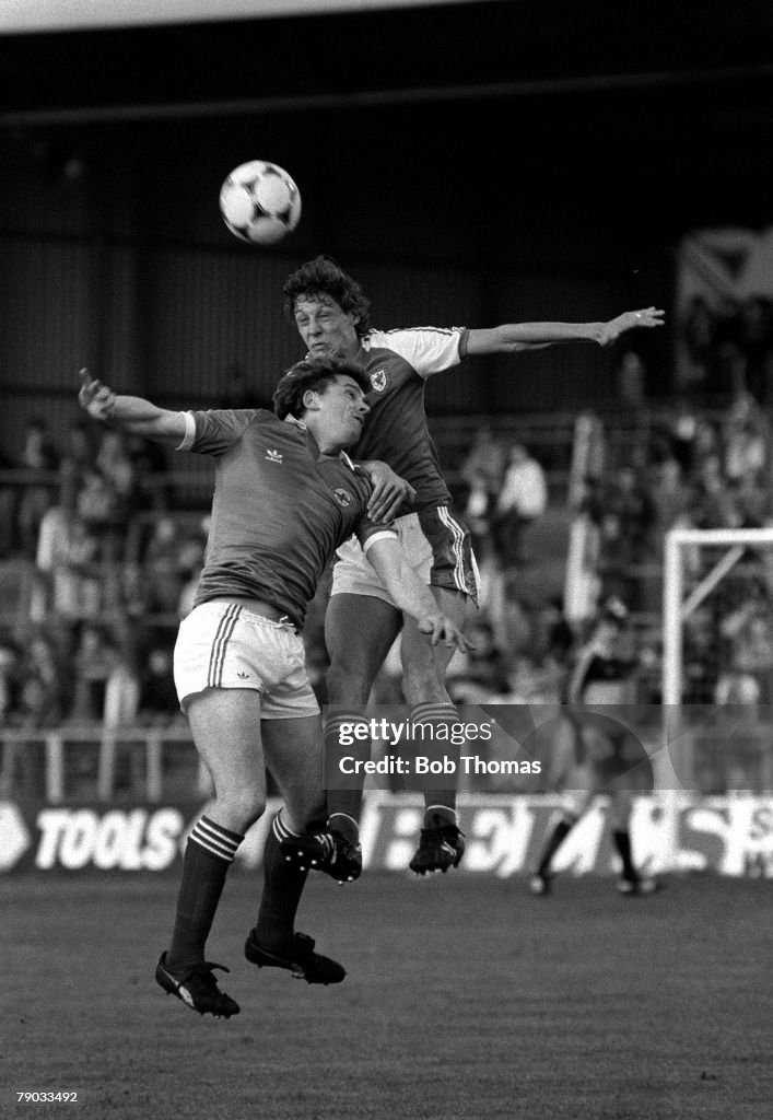 Football. 27th May 1982. Home International. Wales 3 v Northern Ireland 0. Northern Ireland+s Bobby Campbell is beaten in the air by Wales defender Nigel Stevenson.