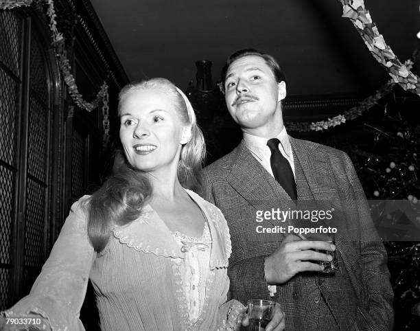 Pinewood Studios, England Scenes from Jean Simmons' Christmas Party organised by "Picturegoer", British actress Ann Todd and actor Ivan Desny enjoy a...