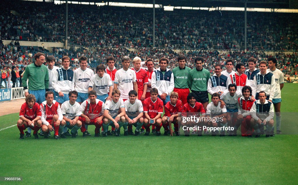 Sport. Football League Centenary Match. Wembley, London, England. 8th August 1987. Football League 3 v Rest of the World 0. The players pose together for a group photograph after the match. Back Row L-R: Steve Ogrizovic, Alan Smith, Richard Gough, Chris W