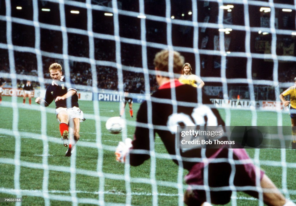 1990 World Cup Finals. Genoa, Italy. 16th June, 1990. Scotland 2 v Sweden 1. Scotland's Mo Johnston scores his goal from the penalty spot past Swedish goalkeeper Thomas Ravelli.