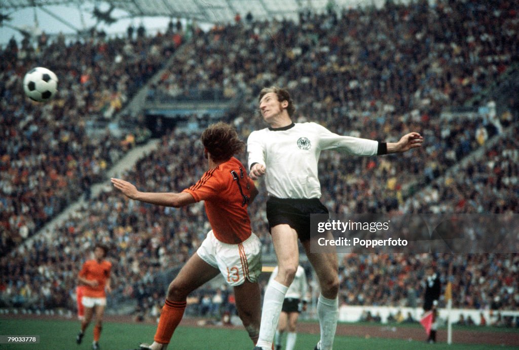 1974 World Cup Final. Munich, West Germany. 7th July, 1974. West Germany 2 v Holland 1. West Germany's Hans Wolf Swarzenbeck heads the ball clear from Holland's Johan Neeskens.