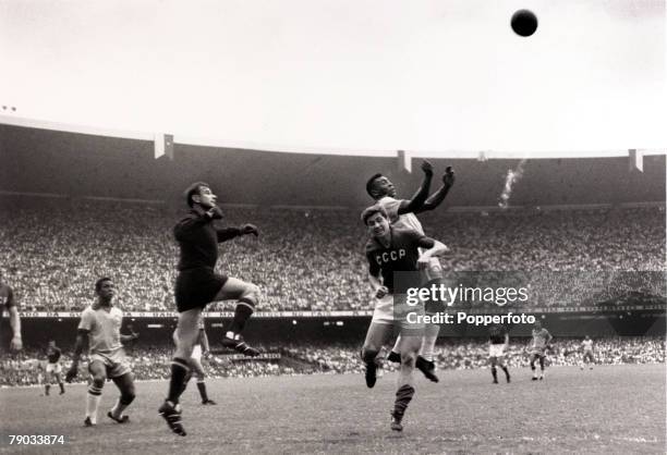Sport, Football, Friendly International, Rio de Janeiro, 21st November 1965, Brazil 2 v Russia 2, Brazil's Pele jumps above a defender as Russia...