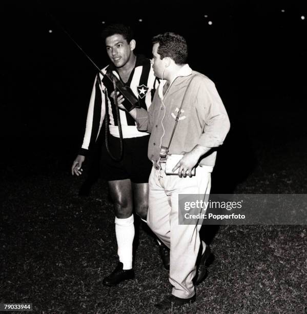 Sport, Football, circa 1960, Brazil star Garrincha in his Botafogo club strip being interviewed after a game, He played 60 times for Brazil and with...