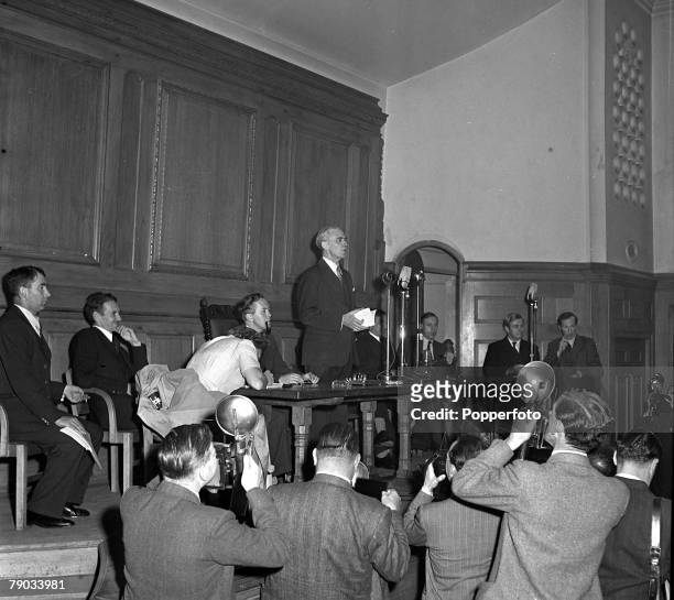 London, England The Chancellor of the Exchequer Sir Stafford Cripps speaks at a Press Conference on the devaluation of the pound sterling at...