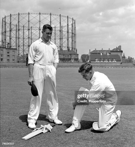 Cricket The Bedser twins Eric and Alec who played for Surrey and England, pictured +padding up+ together on a cricket field