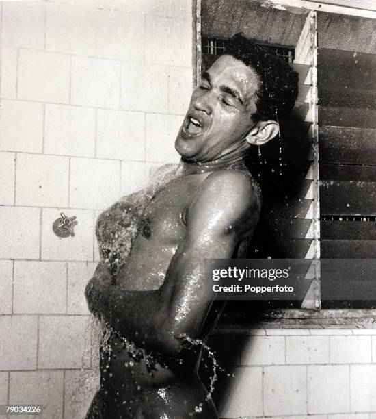 Sport, Football, circa 1960, Brazil star Garrincha appears to be singing in the shower, He played 60 times for Brazil and with he and Pele in the...