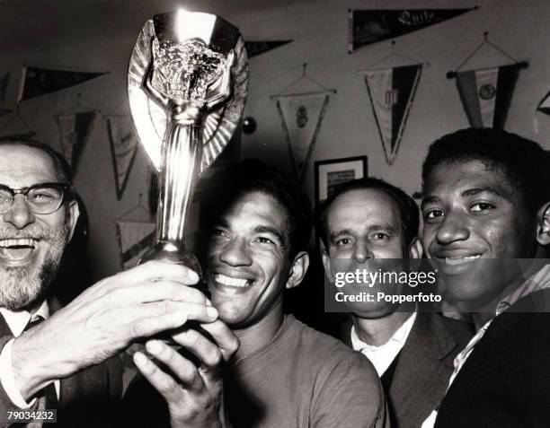 Sport, Football, June 1962, Brazil star Garrincha with the Jules Rimet World Cup trophy after Brazil's win in Chile in the 1962 tournament, He played...