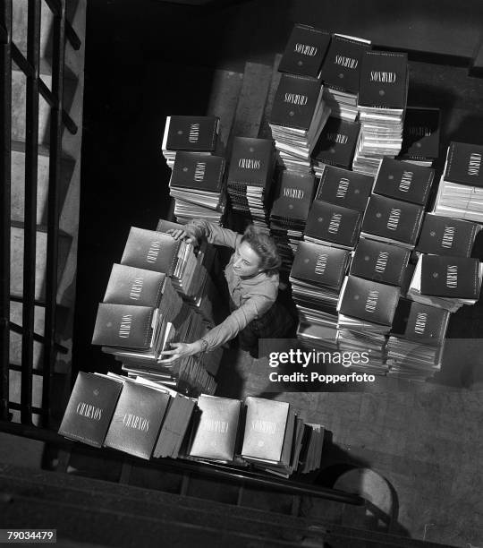 Nottingham, England A worker is picturing checking boxes of nylon hose stockings at the Charnos factory in Ilkeston
