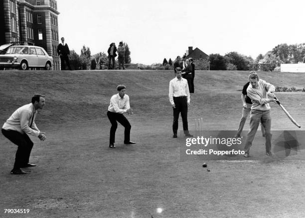 Sport, Football, Roehampton, England, 7th July 1966, A friendly cricket match between the England World Cup football squad, George Eastham hits out...