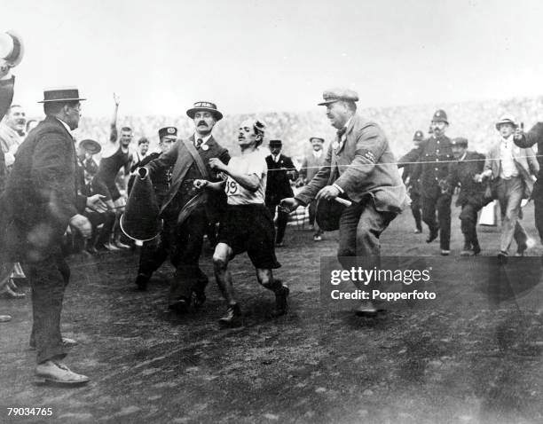 Olympic Games, London, England, Italian runner Dorando Pietri runs towards the tape in the Marathon of the 1908 Games, After the 26 miles miles from...