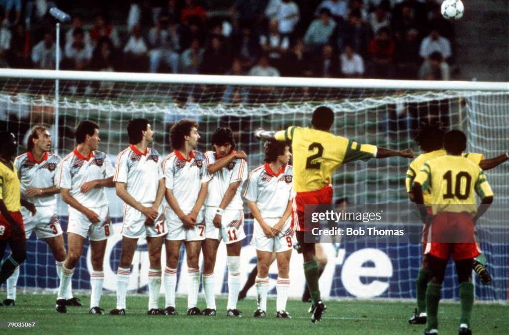 1990 World Cup Finals. Bari, Italy. 18th June, 1990. USSR 4 v Cameroon 0. Cameroon's Andre Kana Biyick takes a free kick which beats the Soviet wall but flies over the cross bar.