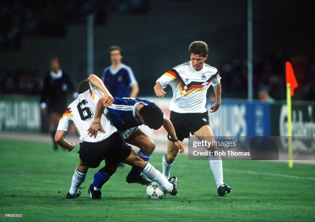 1990 World Cup Final. Rome, Italy. 8th July, 1990. West Germany 1 v Argentina 0. Argentina's Diego Maradona is tackled by West Germany's Guido Buchwald.