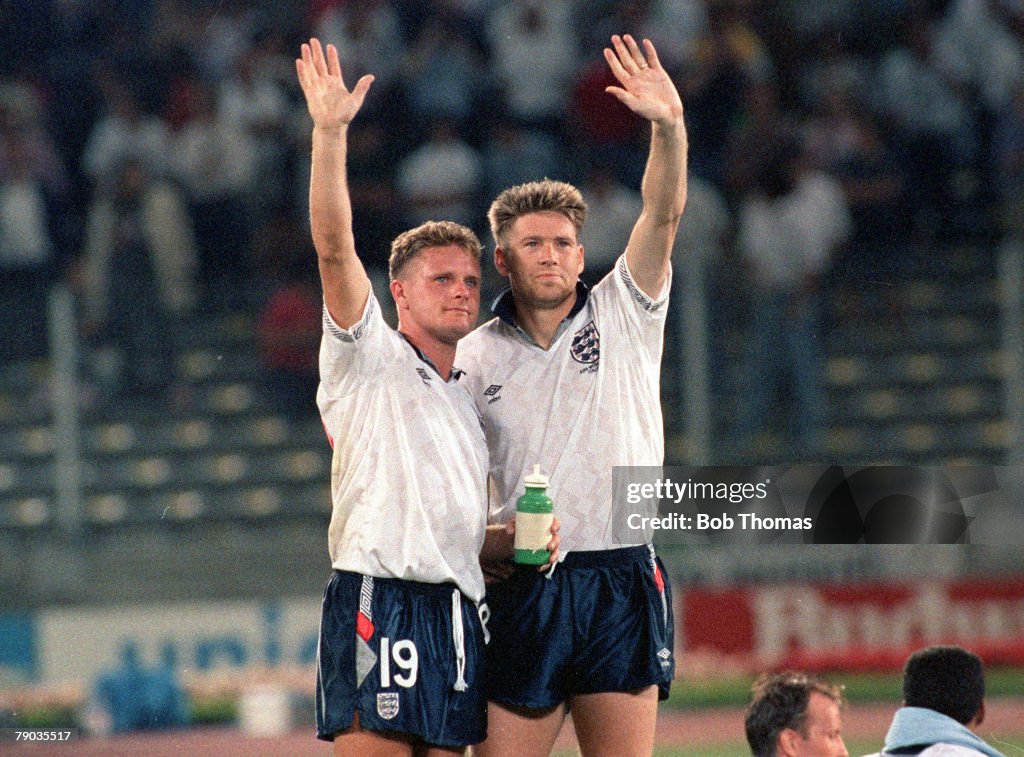 1990 World Cup Semi Final. Turin, Italy. 4th July, 1990. West Germany 1 v England 1 (West Germany win 4-3 on penalties). England's Chris Waddle and Paul Gascoigne wave goodbye to the fans after their team was eliminated on penalties.