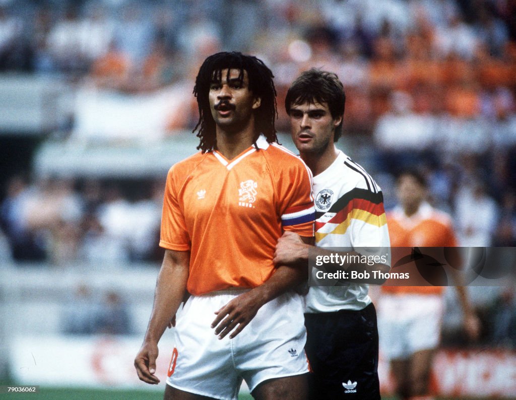 1990 World Cup Finals. Second Phase. Milan, Italy. 24th June, 1990. West Germany 2 v Holland 1. West Germany's Thomas Berthold closely marks Holland's Ruud Gullit.