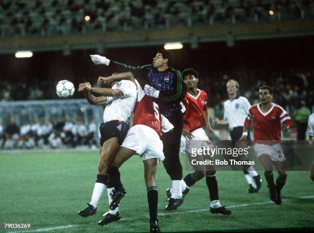 World Cup Finals, Cagliari, Italy, 21st June England 1 v Egypt 0, Egyptian goalkeeper Shoubeir punches the ball clear under pressure from England's...