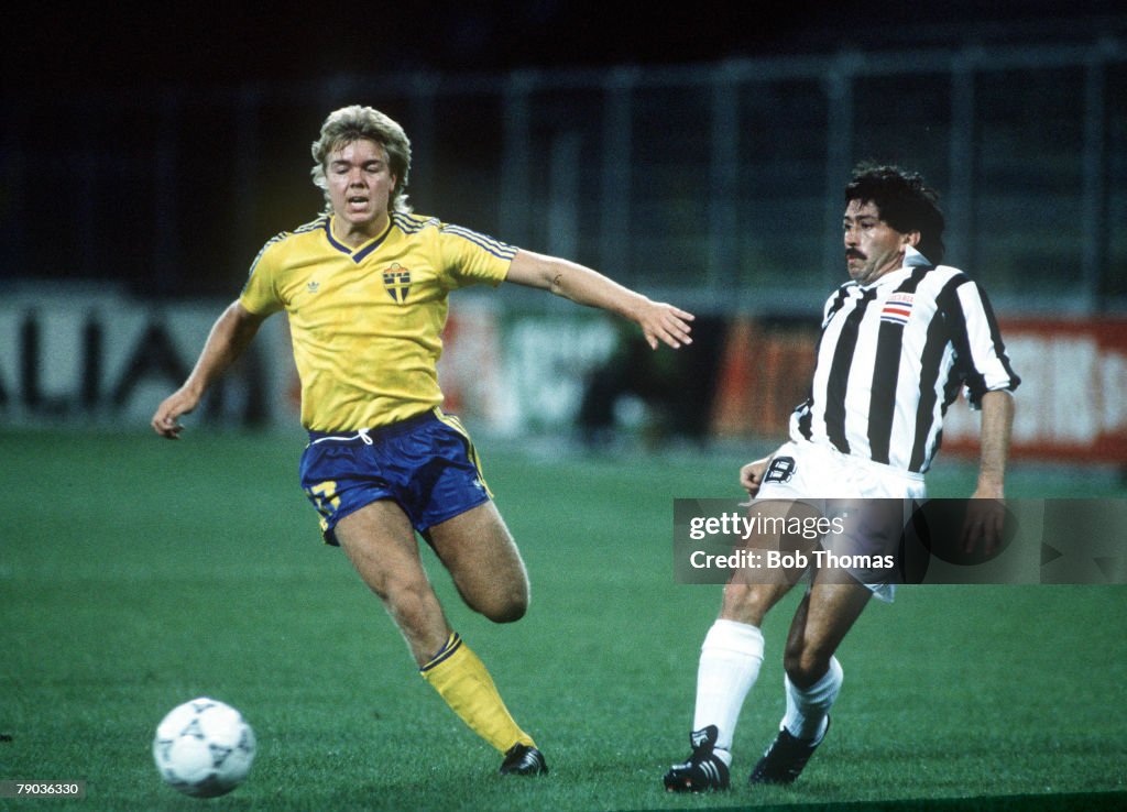 1990 World Cup Finals. Genoa, Italy. 20th June, 1990. Costa Rica 2 v Sweden 1. Sweden's Thomas Brolin is chased for the ball by Costa Rica's German Chavarria.