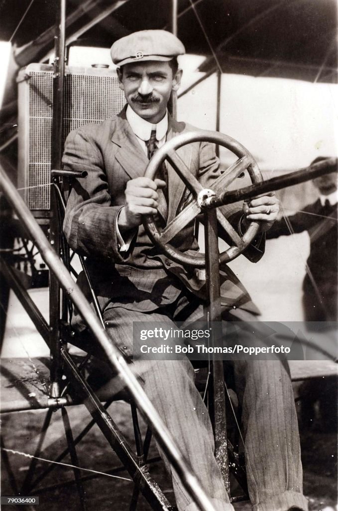 Early Aviation. The American aviator Glenn H. Curtiss sitting in his monoplane, he piloted -The June Bug++ in July 1908, which was the first kilometer flight. (1878-1930)