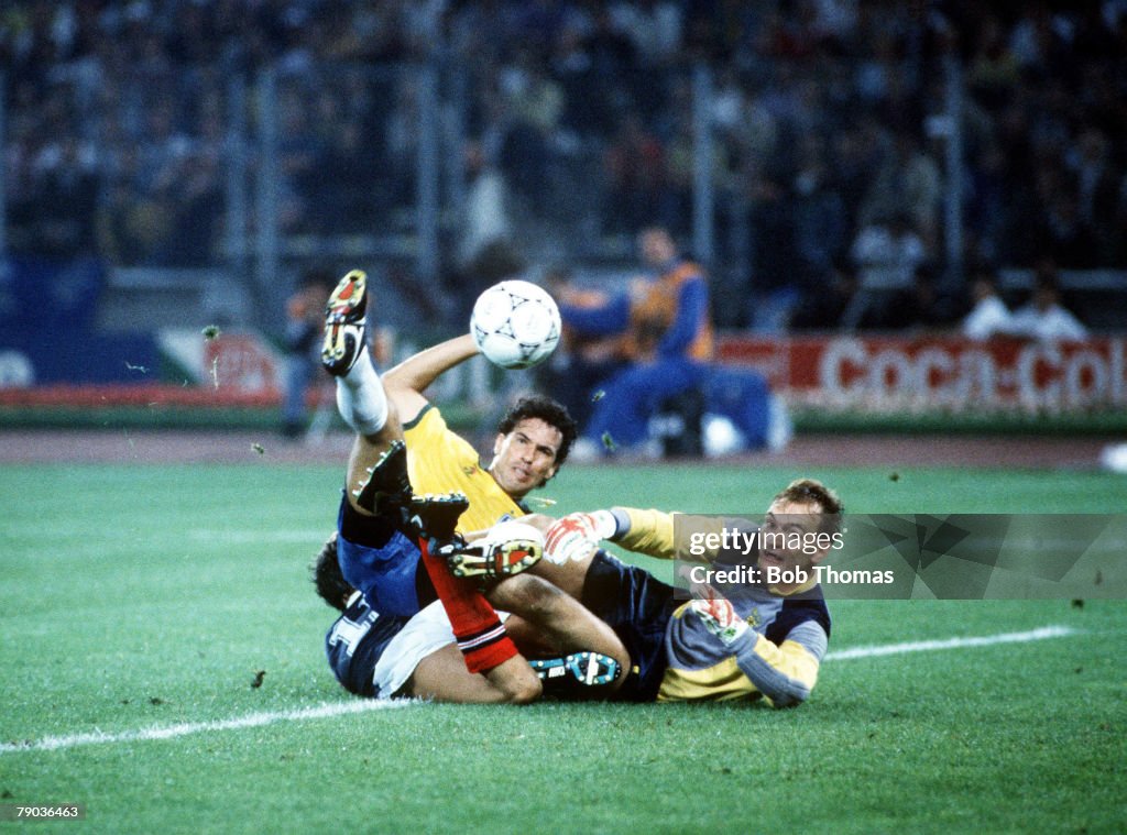 1990 World Cup Finals. Turin, Italy. 20th June, 1990. Brazil 1 v Scotland 0. Scottish goalkeeper Jim Leighton fails to a hold a shot by Brazilian striker Careca. The ball ran loose to Muller who tapped in the only goal of the game to eliminate Scotland fr